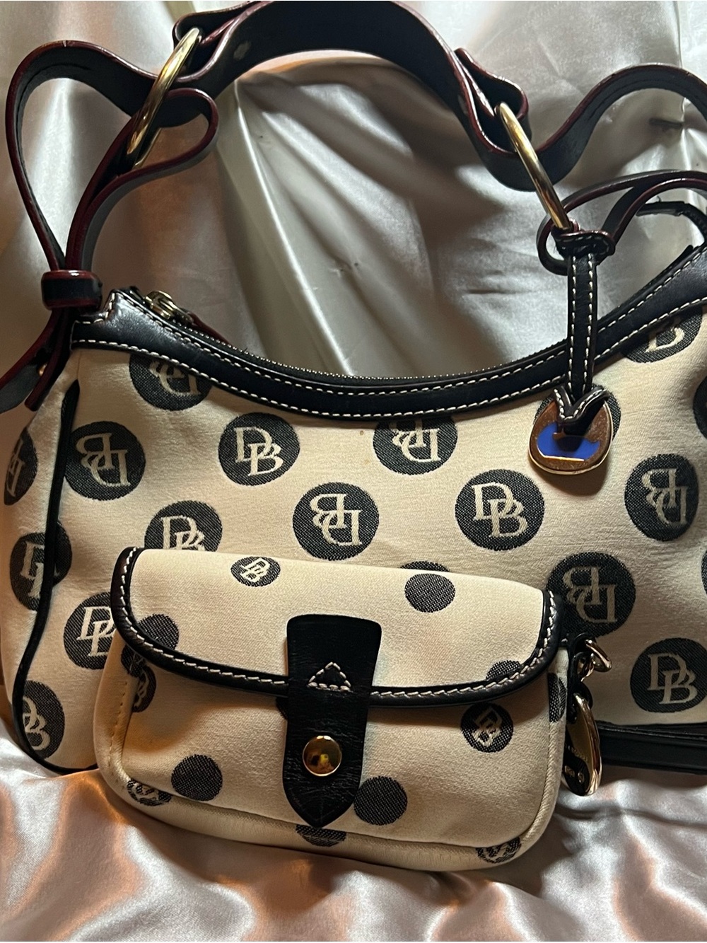 Dooney & Bourke Brown and Cream Logo Shoulder Bag. Jewelry/Sunglasses included.